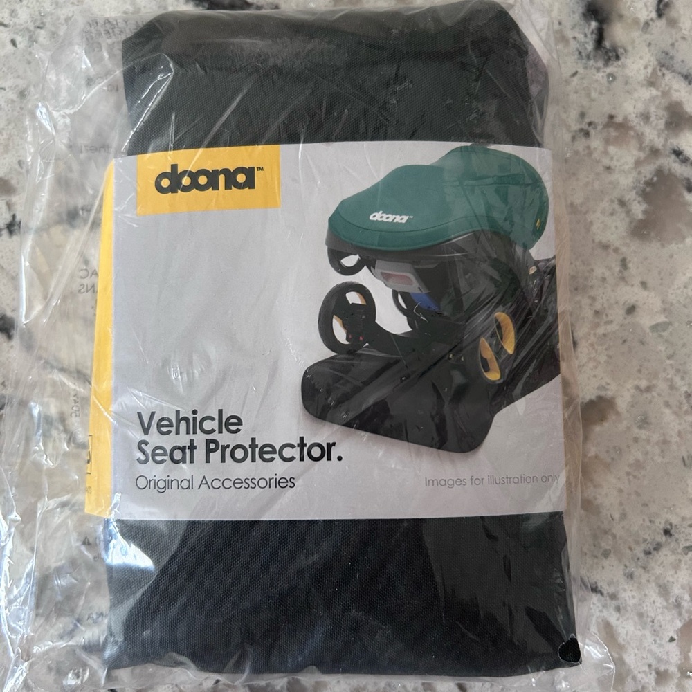 New in Bag Doona  seat protector